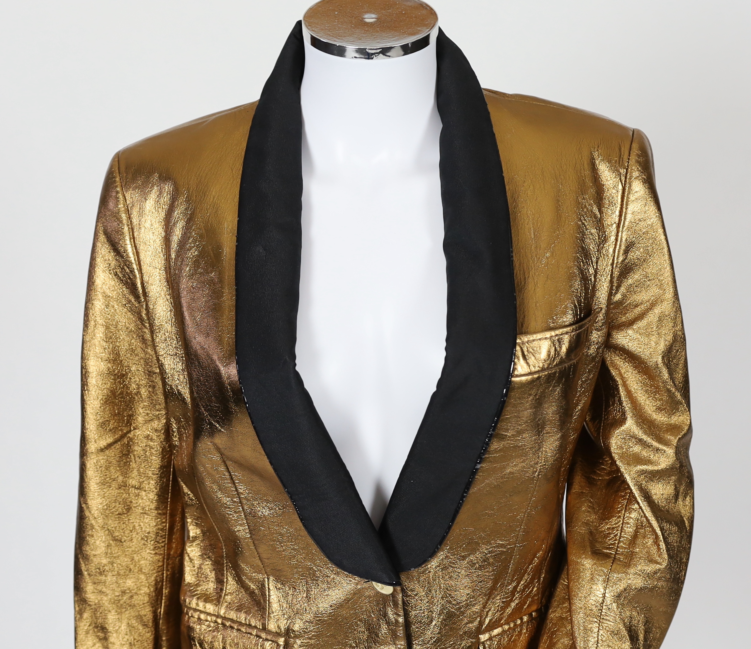 A lady's Dolce & Gabbana gold metallic leather jacket, size 42